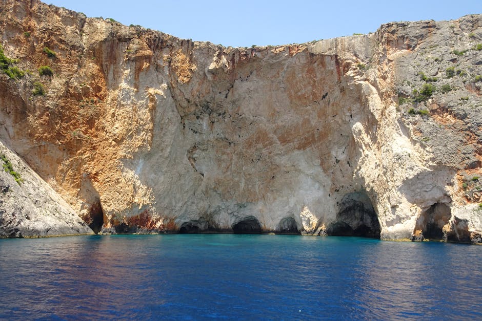 Keri Caves Zakynthos red rock sea caves sunset view