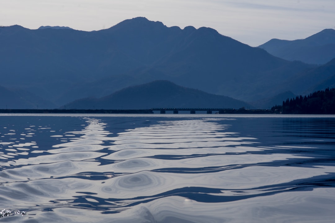 Lake Skadar night calm water moonlight