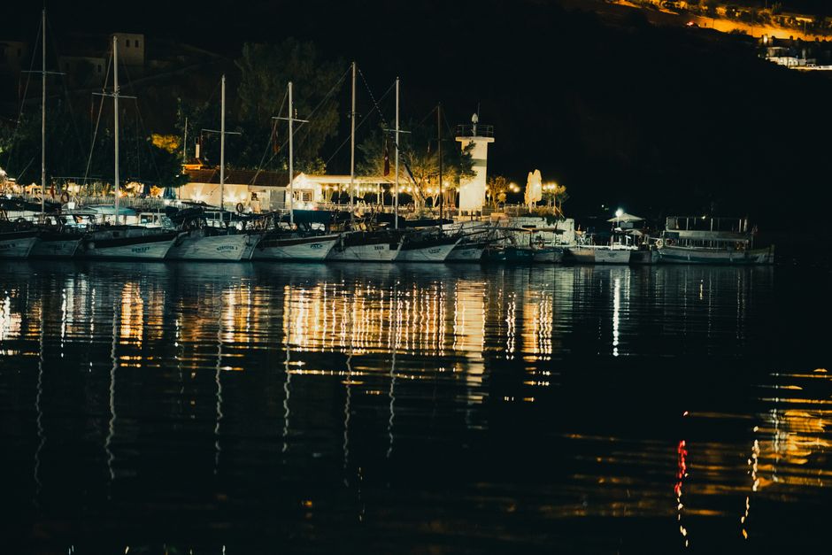 Biševo harbor evening calm sea lights