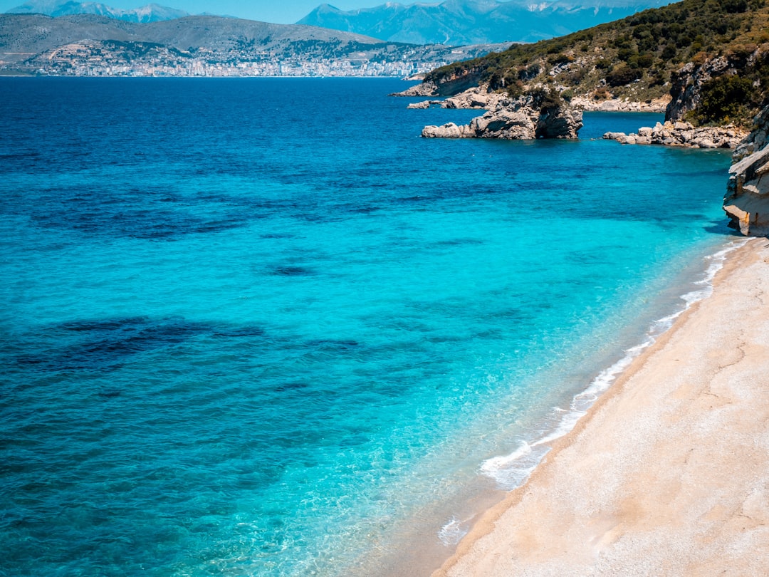 Ksamil Beach 4 Albania narrow strip shell sand snorkeling clear water