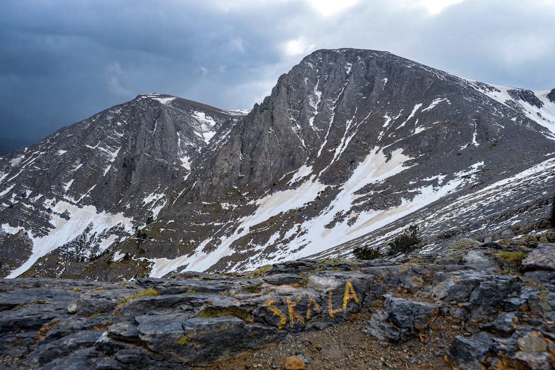 Mount Olympus Greece Mytikas peak summit view clouds granite