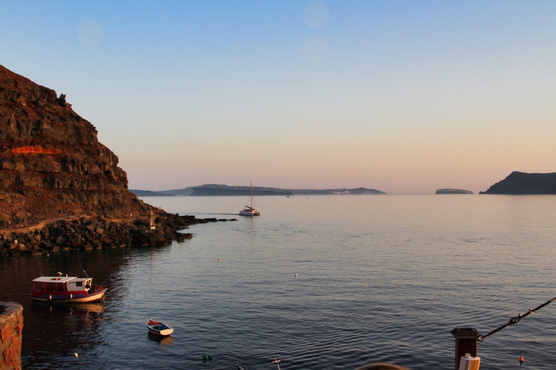 Red Beach Santorini red cliffs volcanic sand sunset