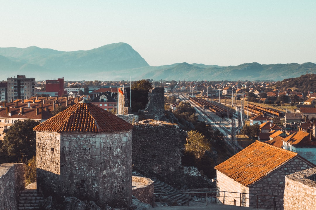 Kotor Venetian Ramparts stone walls modern city view