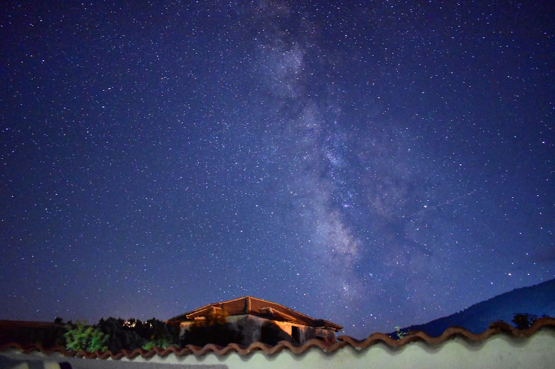 Theth village night Albania stars bar outdoor seating