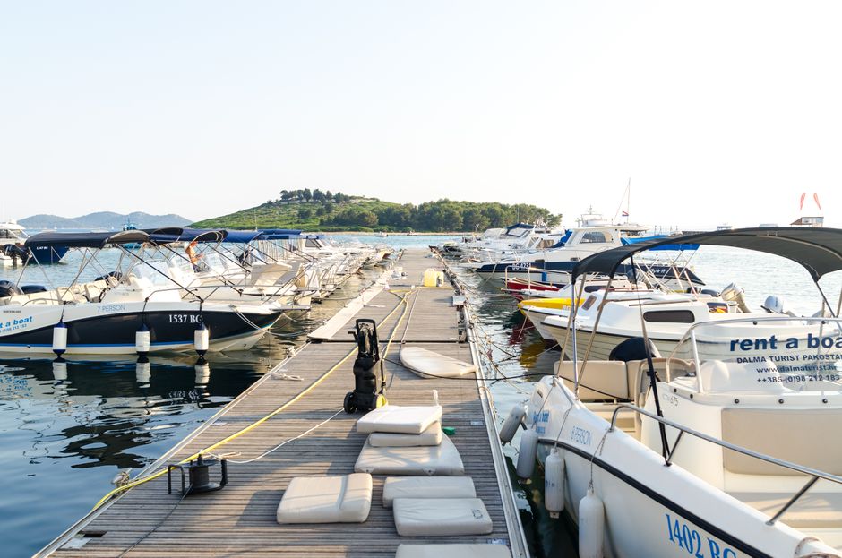 Ploče harbor Mljet Croatia kayak rental boat launch morning light