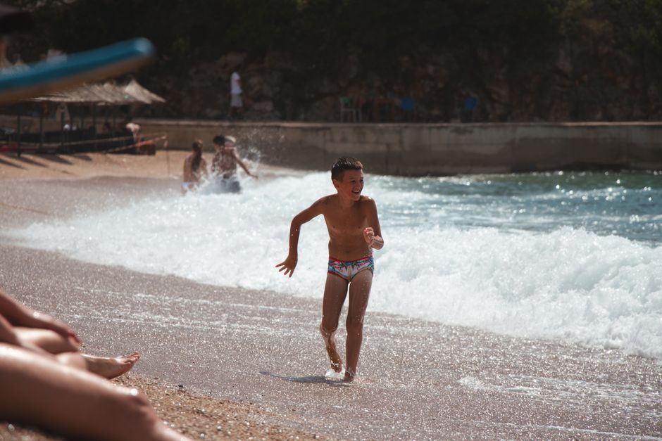 Ksamil Beach 2 Albania calm water shell sand families swimming